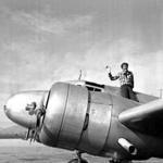FILE - In a March 10, 1937 file photo American aviatrix Amelia Earhart waves from the Electra before taking off from Los Angeles, Ca., on March 10, 1937. Earhart is flying to Oakland, Ca., where she and her crew will begin their round-the-world flight to Howland Island on March 18. (AP Photo, file)
